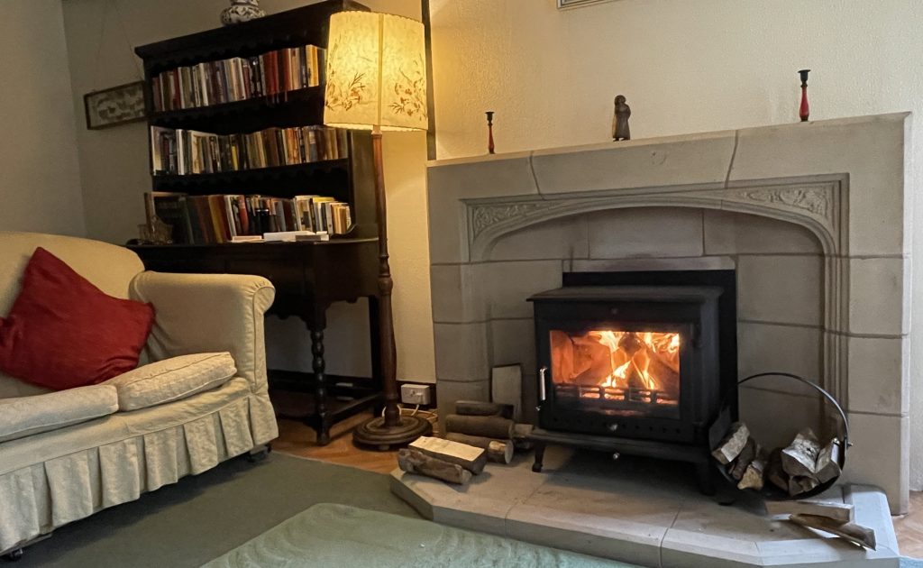 Cozy living area with a woodburner at Windy Gap, a short drive from the British Open Golf.