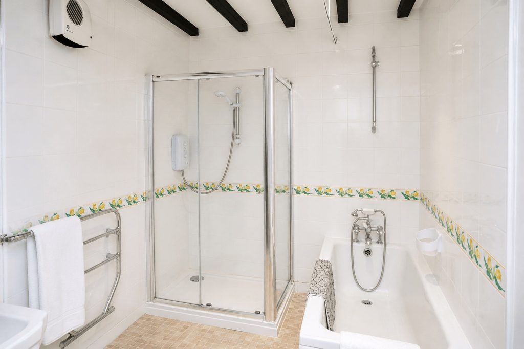 Bathroom at Windy Gap with bath and separate shower