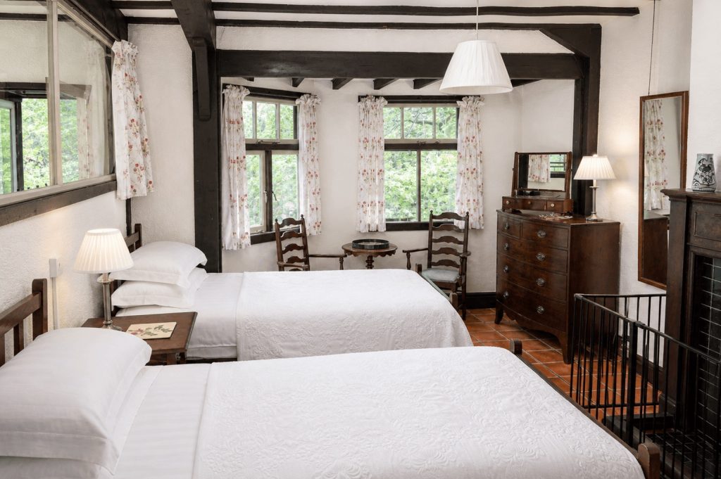 Large twin bedroom overlooking woodland at Windy Gap